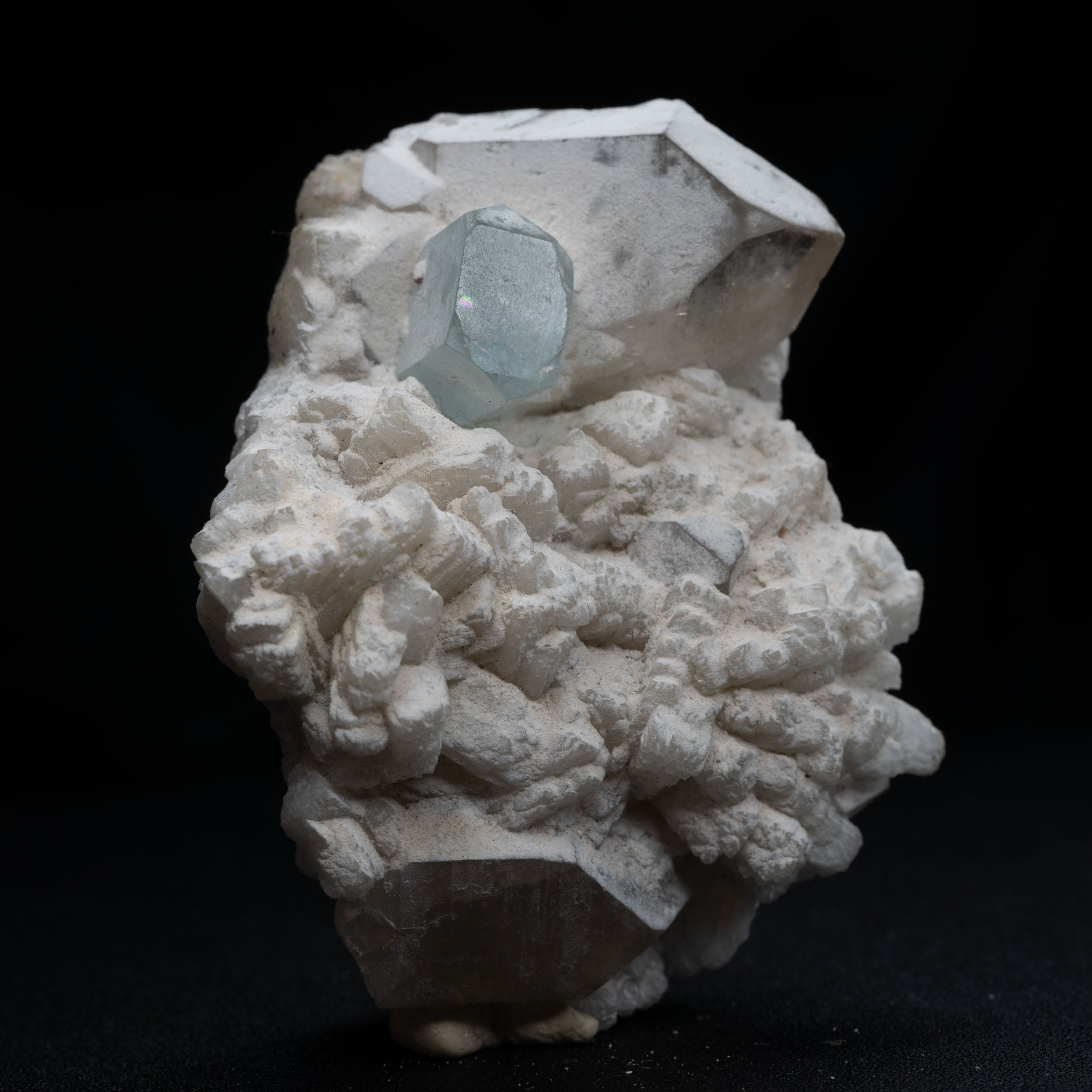 Aquamarine Nestled in Snow-White Albite with Smoky Quartz & Garnet Accents
