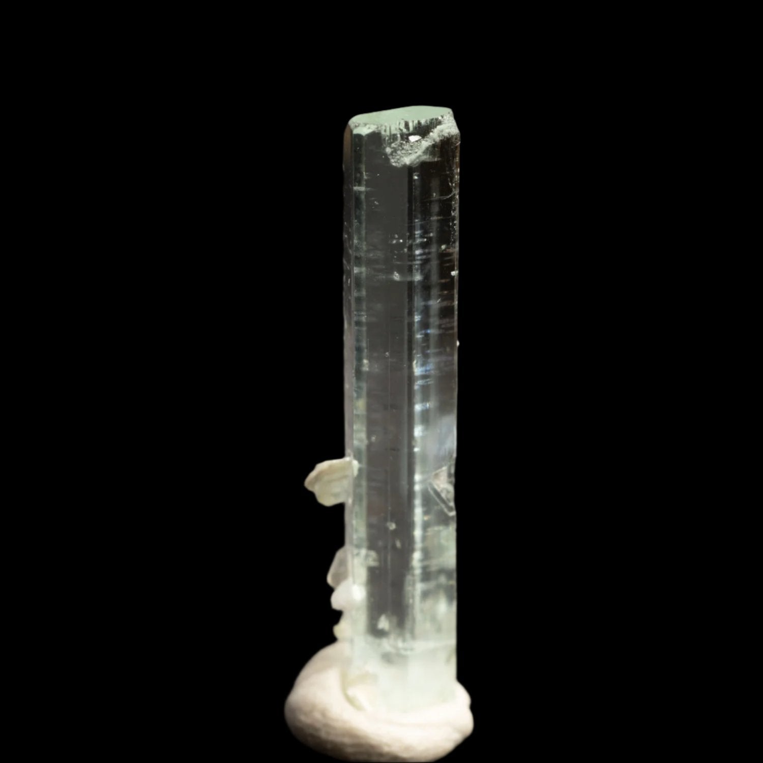 Beryl var. Aquamarine 8.6ct with Muscovite