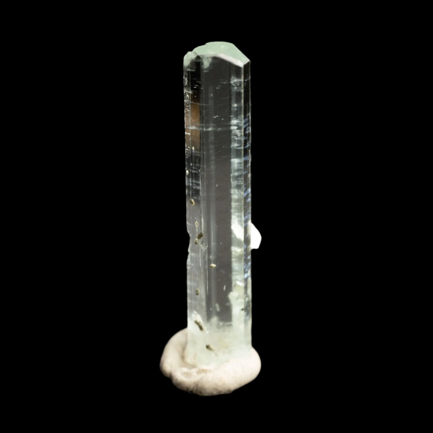 Beryl var. Aquamarine 8.6ct with Muscovite