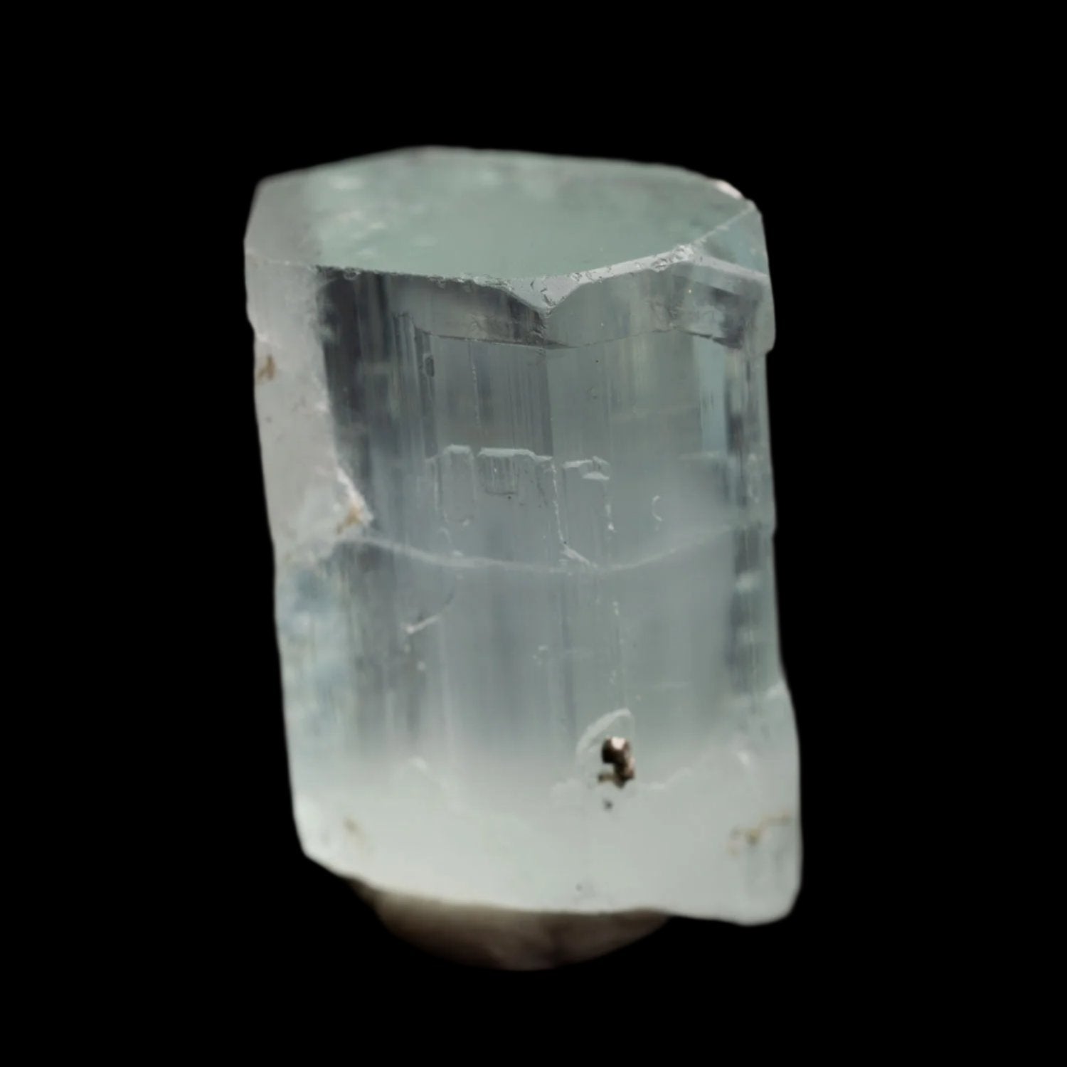 Beryl var. Aquamarine 48ct - Etched, with Muscovite