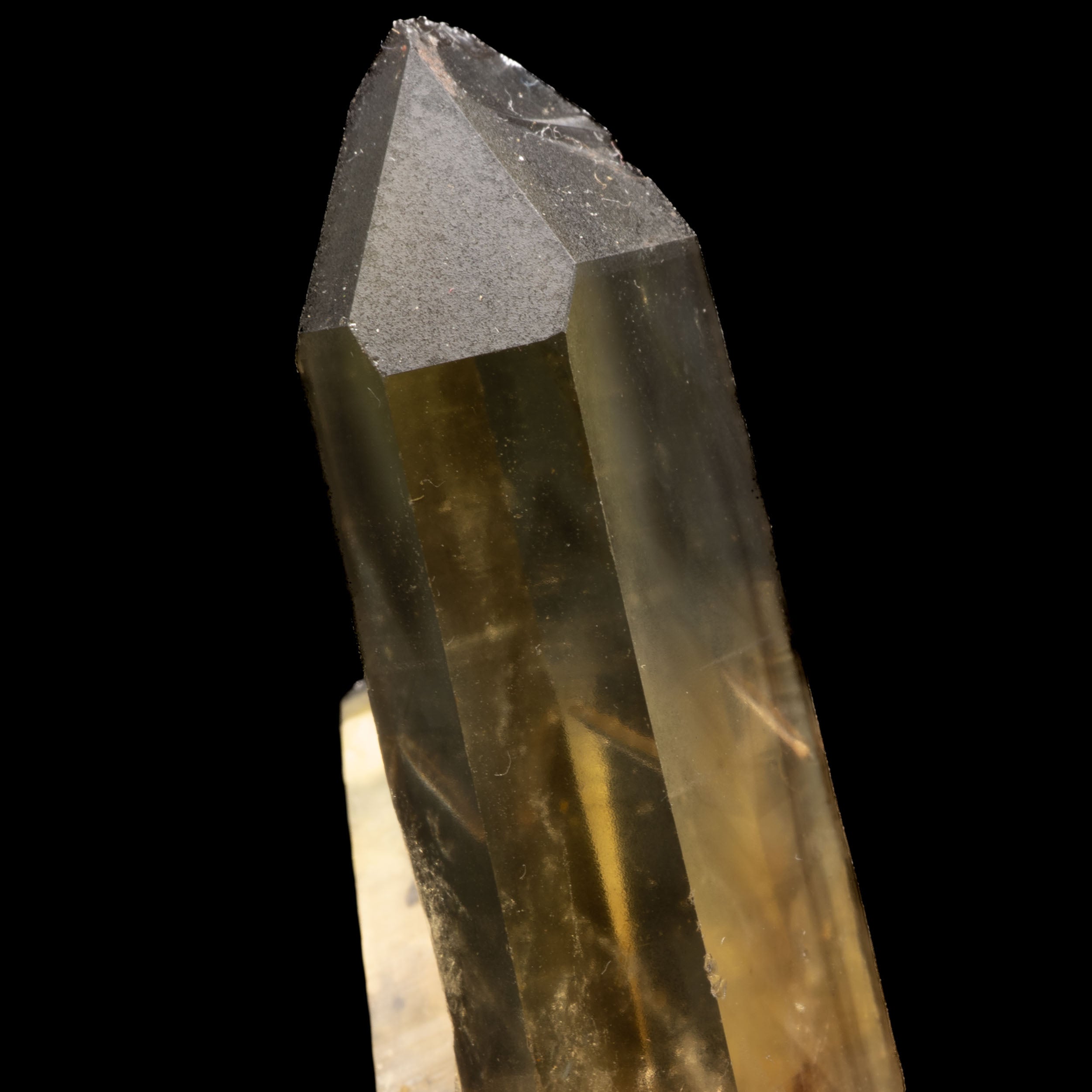 This exquisite Citrine Cluster from Mandrosonoro, Madagascar, radiates a captivating yellow hue and provides remarkable clarity. Boasting two large twin points with self-healed terminations, this natural art piece offers a unique Lemurian-like effect for an eye-catching display in any home.