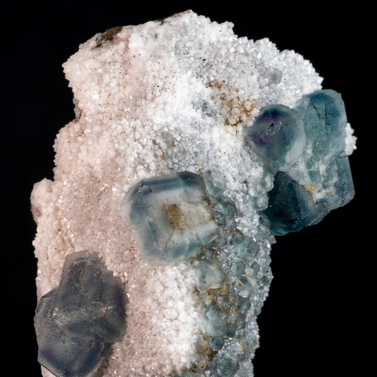 Stunning contrast of Aqua Blue Fluorite against its druzy matrix backdrop.