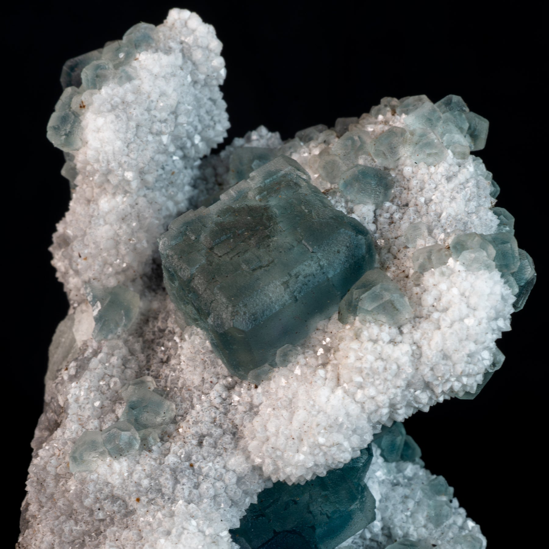 Aqua Blue Fluorite on Druzy Matrix 85g