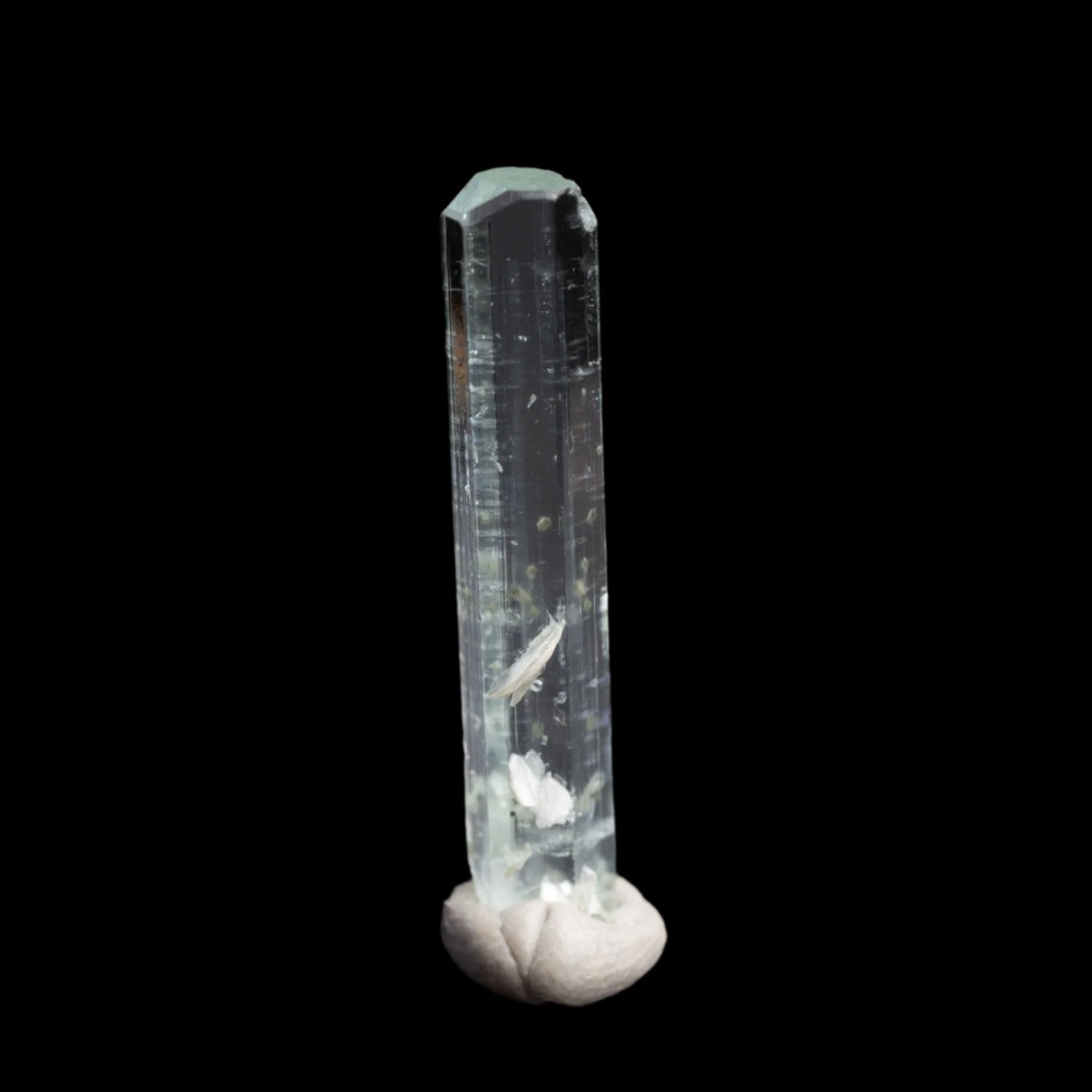 Beryl var. Aquamarine 8.6ct with Muscovite