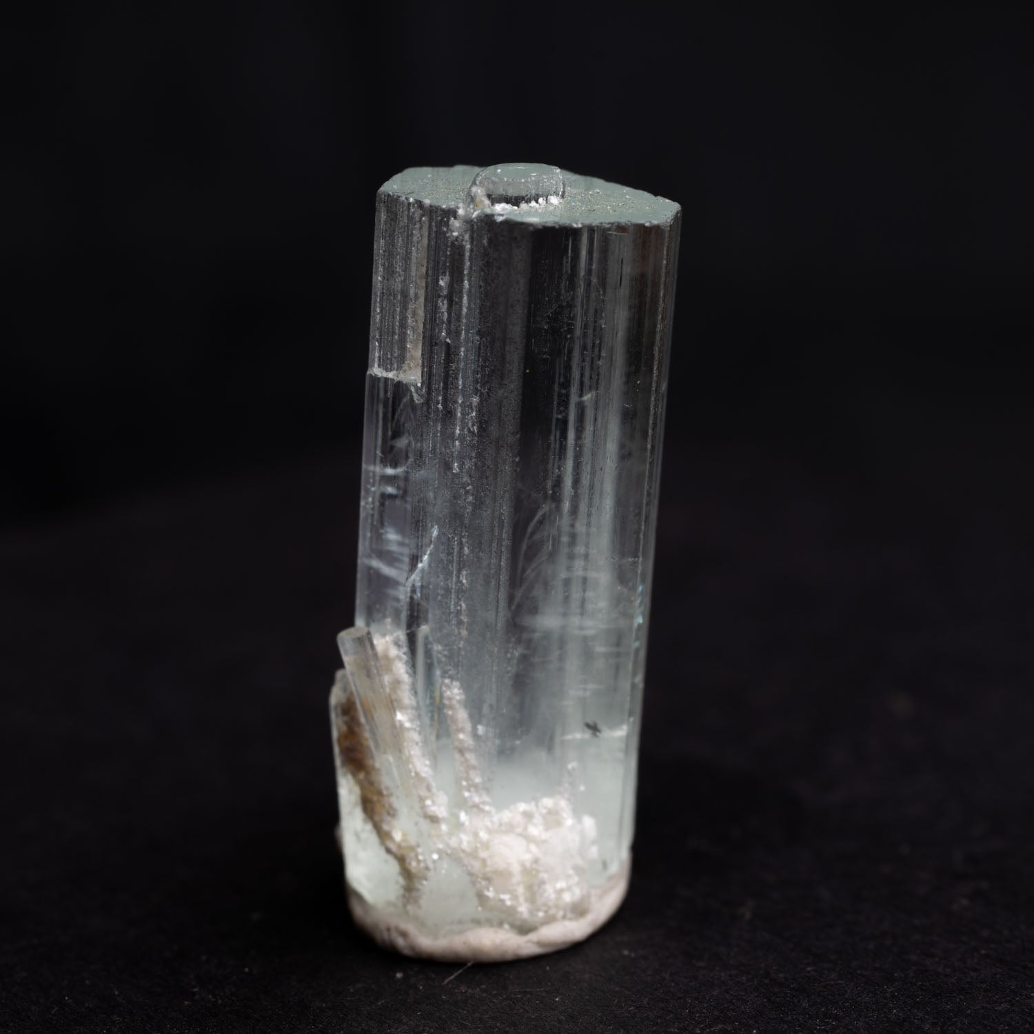 Beryl var. Aquamarine 18.5ct with Muscovite