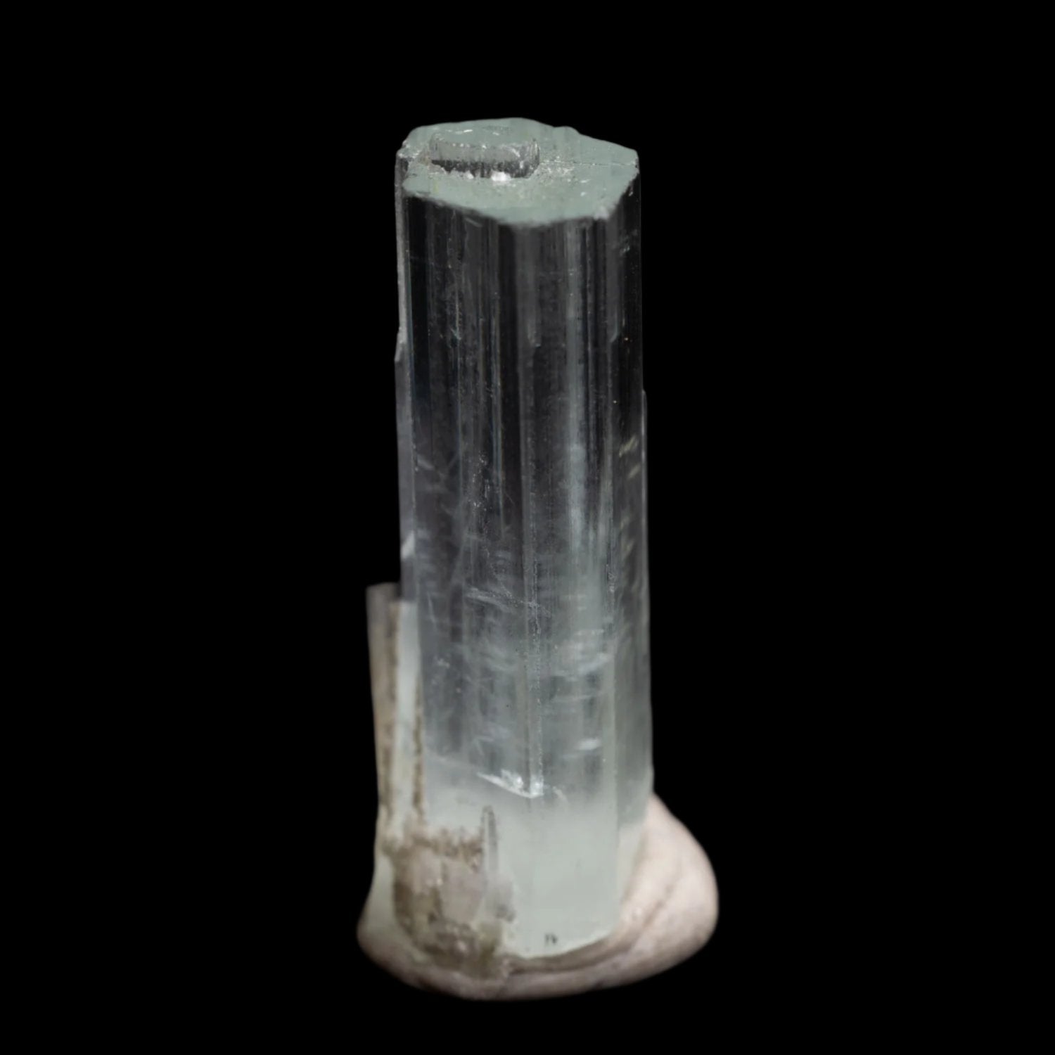 Beryl var. Aquamarine 18.5ct with Muscovite