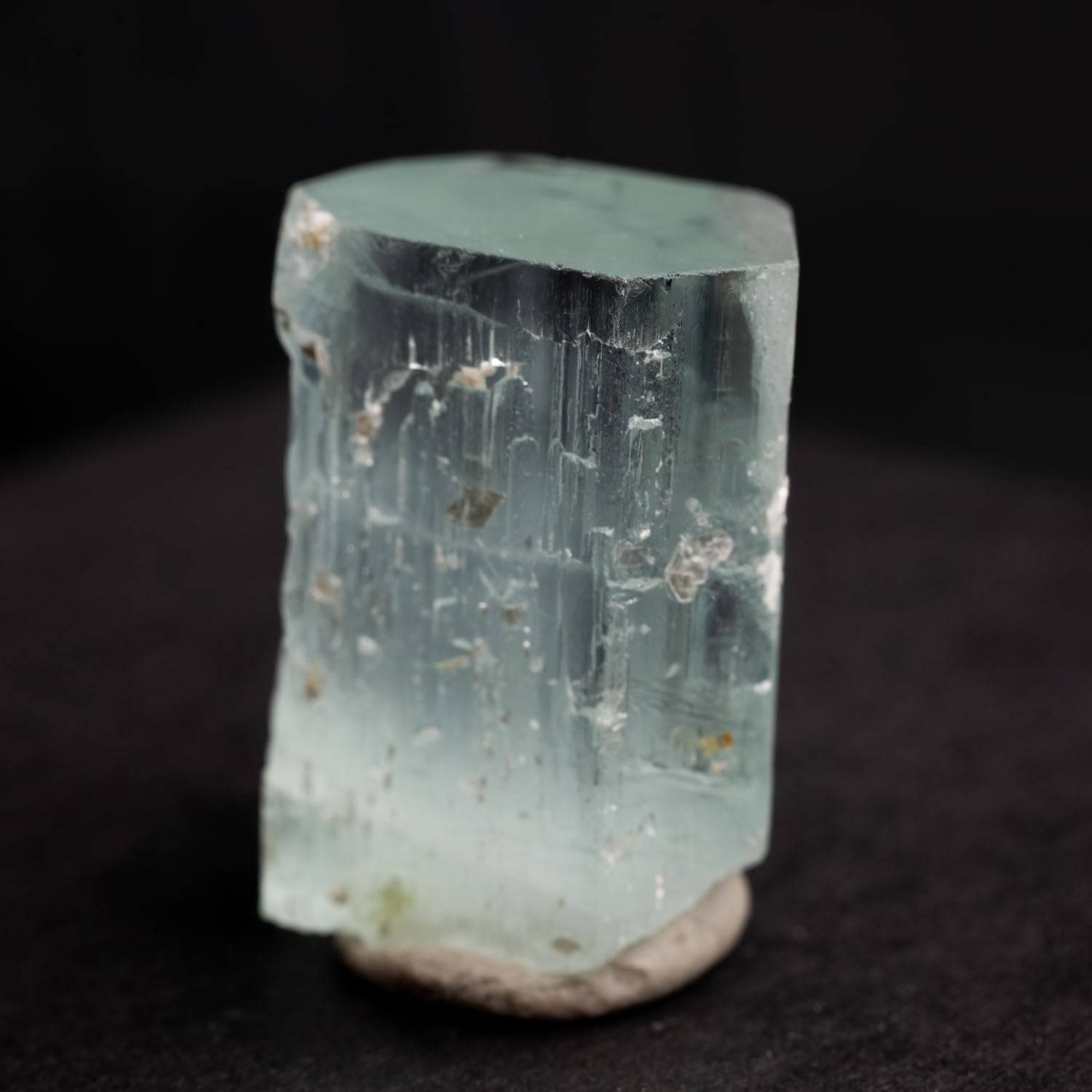 Beryl var. Aquamarine 48ct - Etched, with Muscovite