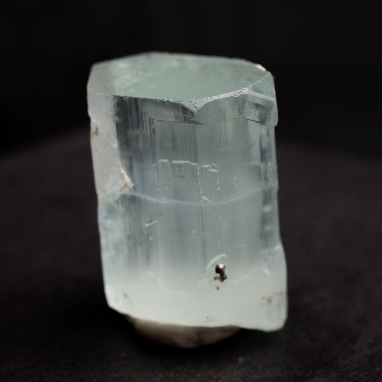 Beryl var. Aquamarine 48ct - Etched, with Muscovite